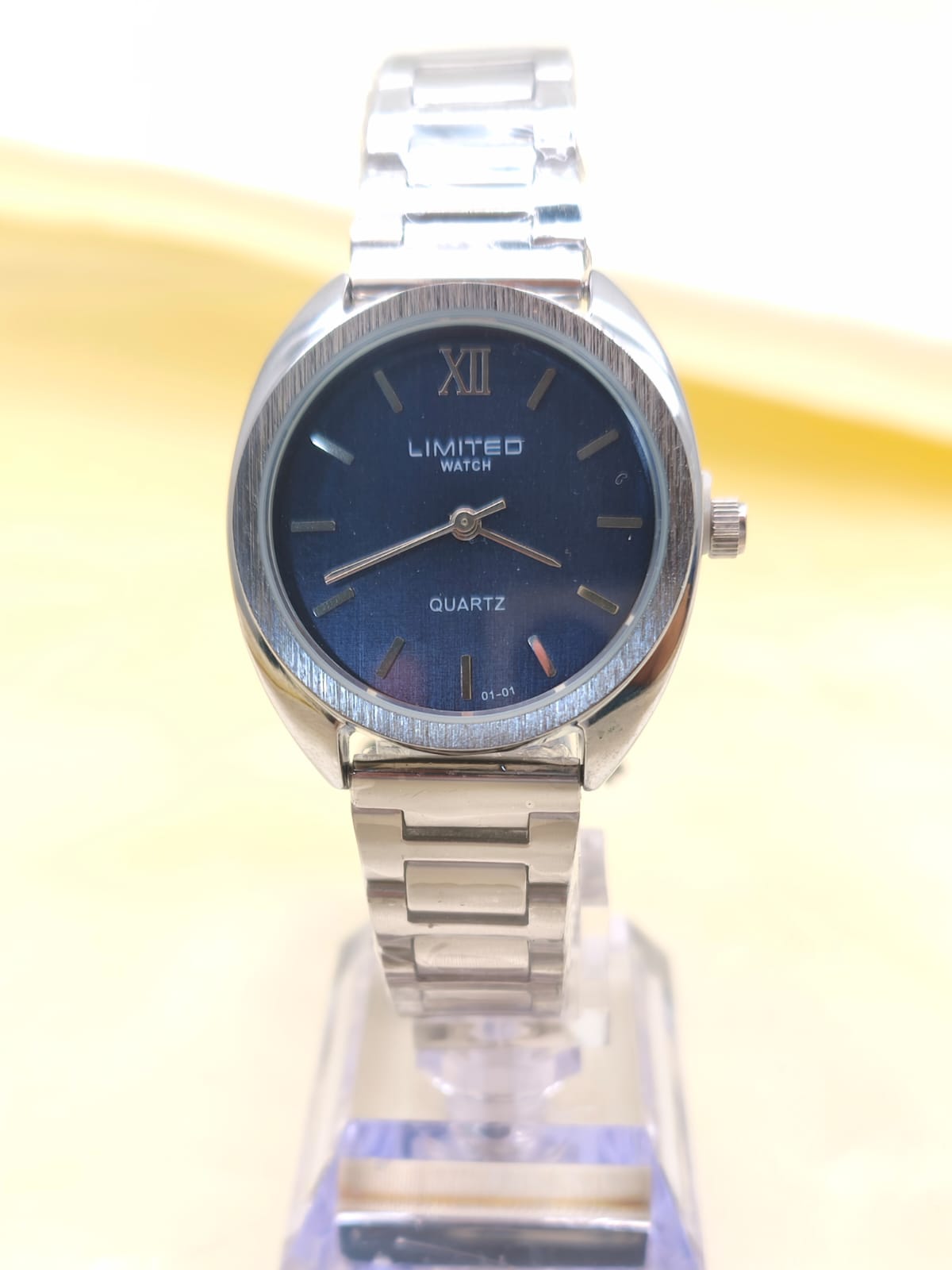 RELOJ LIMITED PLATEADO